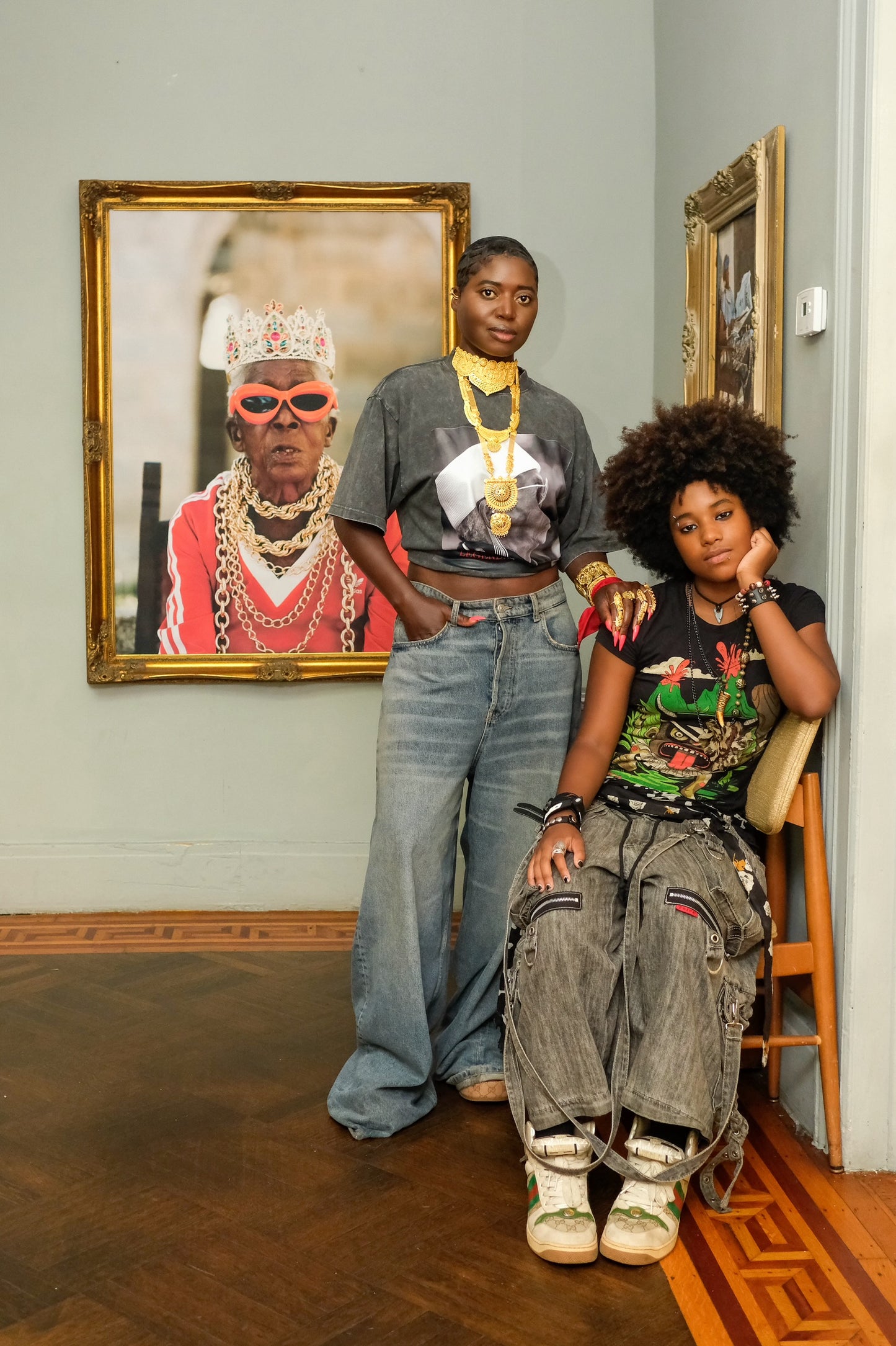EXHIBITION TEE.